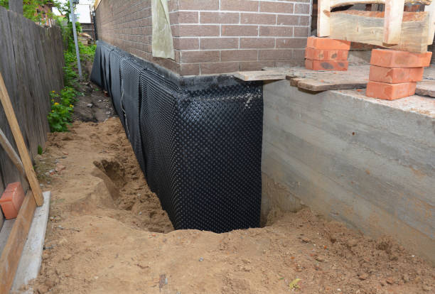 Happy homeowners after waterproofing job in Vernon Hills